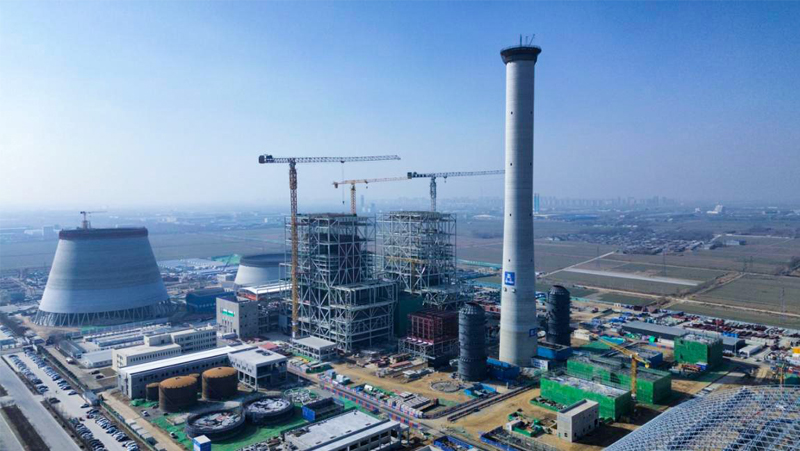 山東能源聊城祥光2×66萬千瓦熱電聯產項目煙囪外筒順利封頂